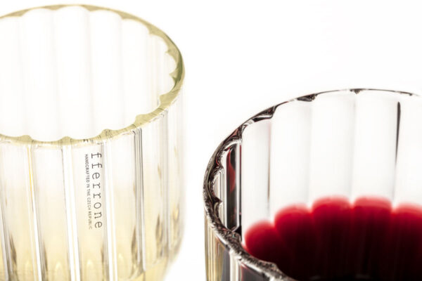Close-up detail shot of Fferrone Dearborn glassware in fluted borosilicate glass, featuring the "fferrone" brand logo and highlighting light refraction | Kneen & Co