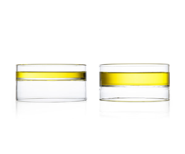 Minimalist white studio background with a pair of Fferrone Revolution Small Bowls in borosilicate glass | Kneen & Co