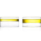 Minimalist white studio background with a pair of Fferrone Revolution Small Bowls in borosilicate glass | Kneen & Co