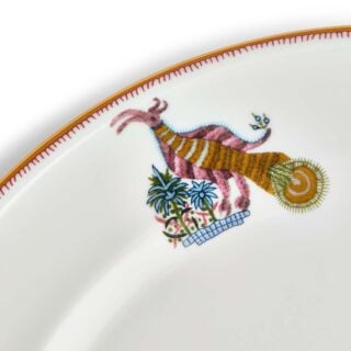 701587151733-Wedgwood-Mythical Creatures-Serv Plate 31cm-12pt25in-detail-1200×1200-100KB Close-up studio shot with Wedgwood Kit Kemp Mythical Creatures Charger Plate in fine bone china featuring whimsical animal illustrations and gold rim detailing | Kneen & Co