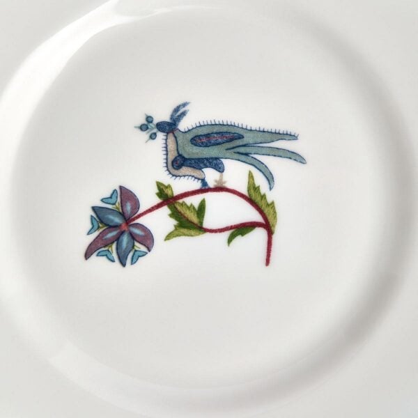 701587190299-Wedgwood-Mythical-Creatures-Plate-15pt5cm-6in-detail-1200x1200-100KB Close-up studio shot with Wedgwood Kit Kemp Mythical Creatures Bread Plate in fine bone china featuring whimsical animal illustrations and gold rim detailing | Kneen & Co