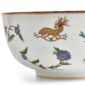 Close-up studio shot with Wedgwood Mythical Creatures salad bowl in fine bone china featuring whimsical animal illustrations and gold rim detailing | Kneen & Co