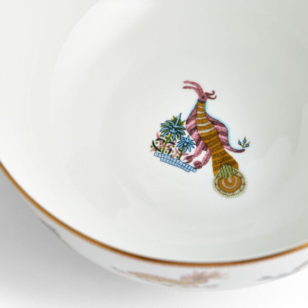 701587237390-Wedgwood-Mythical-Creatures-Salad-Bowl-20pt5cm-8pt1in-detail3-1200x1200-100KB Close-up studio shot with Wedgwood Mythical Creatures salad bowl in fine bone china featuring whimsical animal illustrations and gold rim detailing | Kneen & Co