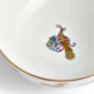 Close-up studio shot with Wedgwood Mythical Creatures salad bowl in fine bone china featuring whimsical animal illustrations and gold rim detailing | Kneen & Co