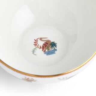 701587237420-Wedgwood-Mythical-Creatures-Cereal-Bowl-15cm-6in-Pgn-detail-1200×1200-100KB Close-up studio shot with Wedgwood Mythical Creatures cereal bowl in fine bone china featuring whimsical animal illustrations and gold rim detailing | Kneen & Co