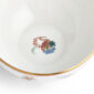 Close-up studio shot with Wedgwood Mythical Creatures cereal bowl in fine bone china featuring whimsical animal illustrations and gold rim detailing | Kneen & Co