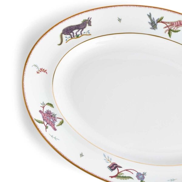 701587237444-Wedgwood-Mythical-Creatures-Oval-Plat-35cm-13pt8in-detail-1200x1200-100KB Close-up studio shot with Wedgwood Kit Kemp Mythical Creatures Oval Platter in fine bone china featuring whimsical animal illustrations and gold rim detailing | Kneen & Co