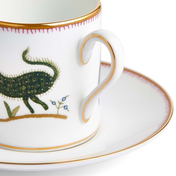 701587253062-Wedgwood-Mythical-Creatures-Coffee-Cup+Saucer-BXD-detail-1200x1200-100KB Close-up studio shot with Wedgwood Kit Kemp Mythical Creatures Coffee Cup and Saucer in fine bone china featuring whimsical animal illustrations and gold rim detailing | Kneen & Co