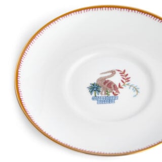 Close-up studio shot with Wedgwood Kit Kemp Mythical Creatures Coffee Saucer in fine bone china featuring whimsical animal illustrations and gold rim detailing | Kneen & Co