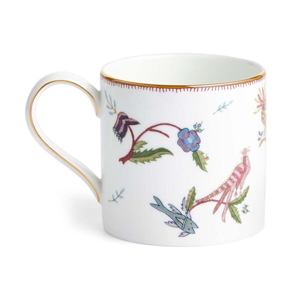 Close-up studio shot with Wedgwood Kit Kemp Mythical Creatures Mug in fine bone china featuring whimsical animal illustrations and gold rim detailing | Kneen & Co