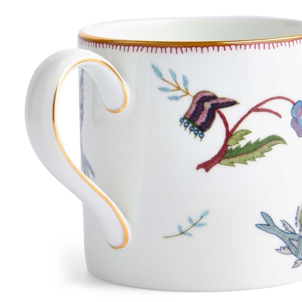 Close-up studio shot with Wedgwood Kit Kemp Mythical Creatures Mug in fine bone china featuring whimsical animal illustrations and gold rim detailing | Kneen & Co