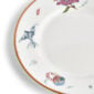 Close-up studio shot with Wedgwood Kit Kemp Mythical Creatures Salad Plate in fine bone china featuring whimsical animal illustrations and gold rim detailing | Kneen & Co