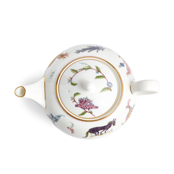 701587253123-Wedgwood-Mythical-Creatures-Large-Sized-Teapot-BXD-overhead-1200x1200-100KB Close-up studio shot with Wedgwood Kit Kemp Mythical Creatures Teapot in fine bone china featuring whimsical animal illustrations and gold rim detailing | Kneen & Co