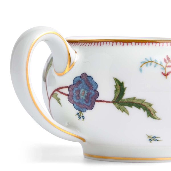 701587253147-Wedgwood-Mythical-Creatures-Large-Sized-Cream-BXD-detail2-1200x1200-100KB Close-up studio shot with Wedgwood Kit Kemp Mythical Creatures Creamer in fine bone china featuring whimsical animal illustrations and gold rim detailing | Kneen & Co