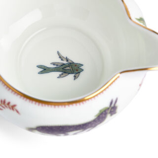 701587253147-Wedgwood-Mythical-Creatures-Large-Sized-Cream-BXD-detail3-1200×1200-100KB Close-up studio shot with Wedgwood Kit Kemp Mythical Creatures Creamer in fine bone china featuring whimsical animal illustrations and gold rim detailing | Kneen & Co