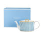 Wedgwood Helia Teapot with Wedgwood’s signature blue gift box featuring neoclassical design finished with 22-carat gold detailing | Kneen & Co