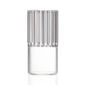 Minimalist studio setting with a dark beverage in a Fferrone Flight Espresso / Liqueur Glass made of borosilicate glass highlighting the small-scale fluted design | Kneen & Co