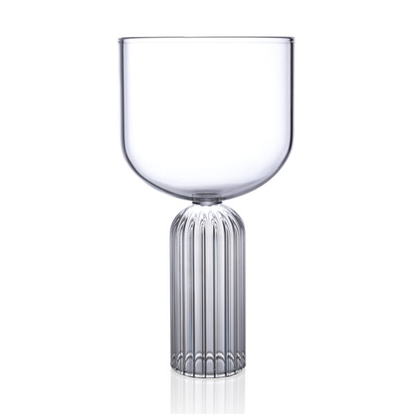 FERRONE-LargeGlass-MALG02-HR-01-Unstyled-1200x1200-100KB Minimalist studio display of a Fferrone May Large Glass in fluted borosilicate glass featuring a wide smooth bowl and a ribbed cylindrical pedestal base | Kneen & Co