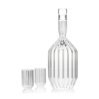 Minimalist studio setting with a Fferrone Margot Decanter and Glasses in borosilicate glass showcasing the collection's intricate fluted texture and architectural silhouette | Kneen & Co
