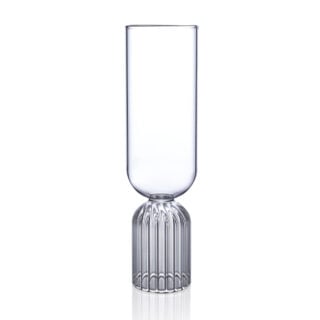 Minimalist studio display of a Fferrone May Flute in fluted borosilicate glass featuring a tall smooth bowl and a ribbed cylindrical pedestal base | Kneen & Co
