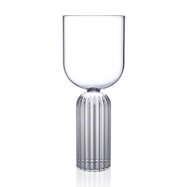 FERRONE-Medium-MAMD02-HR-01-Unstyled-1200x1200-100KB Minimalist studio display of a Fferrone May Medium Glass in fluted borosilicate glass featuring a smooth U-shaped bowl and a ribbed cylindrical pedestal base | Kneen & Co