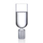Minimalist studio display of a Fferrone May Tall Medium Glass in fluted borosilicate glass filled with water featuring a tall U-shaped bowl and a ribbed cylindrical pedestal base | Kneen & Co