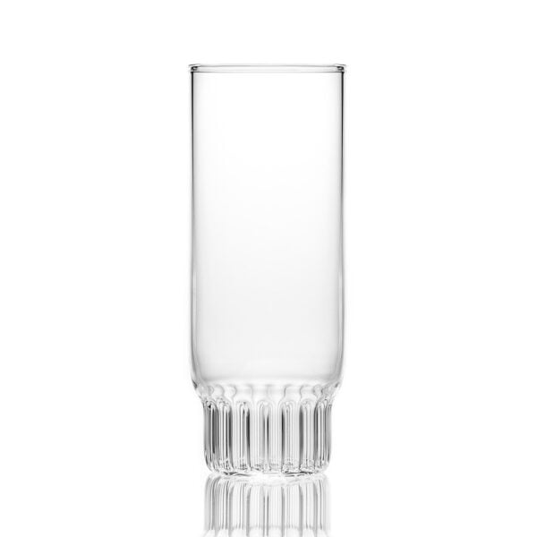 FERRONE-Rasori-Fluted-1200x1200-100KB Minimalist studio display of a Fferrone Rasori Champagne Flute in fluted borosilicate glass featuring a clear tall cylindrical body and a short ribbed base | Kneen & Co