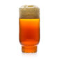 Minimalist studio display of a Fferrone Rasori Glassware in fluted borosilicate glass filled with amber beer and foam | Kneen & Co