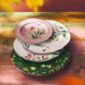 Rustic wooden table set with Ginori 1735 Florenza dinnerware in fine porcelain featuring botanical floral motifs and scalloped edges | Kneen & Co