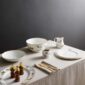 Wedgwood Kit Kemp Mythical Creatures Dinnerware set on dining table | Kneen & Co