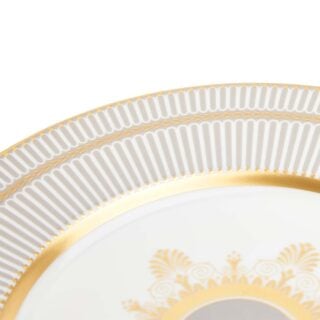 701587432962-Wedgwood-Anthemion-Grey-Plate-22pt8cm-8pt9in-detail2-1200×1200-100KB Close-up shot of Wedgwood Anthemion Grey Salad Plate defined by a sophisticated grey rim and an intricate neoclassical palmette border finished with 22-carat gold detailing | Kneen & Co