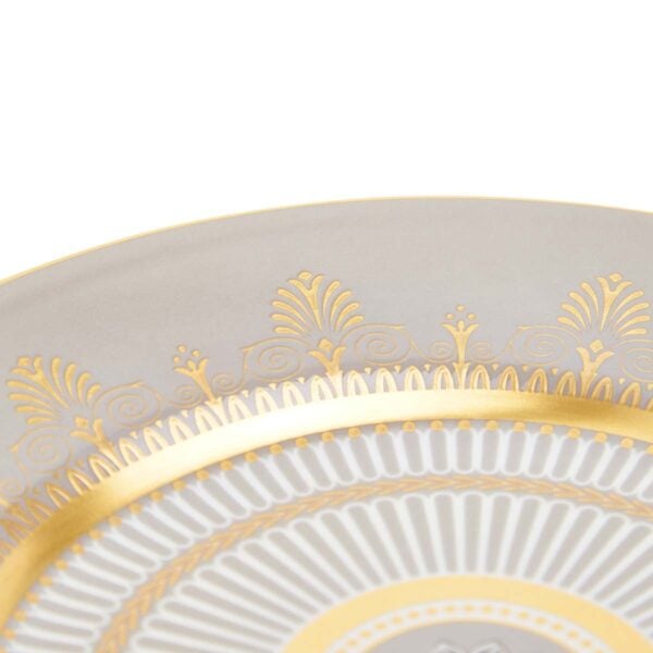 701587432979-Wedgwood-Anthemion-Grey-Plate-20pt6cm-8pt1in-detail2-1200x1200-100KB Close-up shot of Wedgwood Anthemion Grey Side Plate defined by a sophisticated grey rim and an intricate neoclassical palmette border finished with 22-carat gold detailing | Kneen & Co