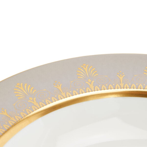701587432993-Wedgwood-Anthemion-Grey-Rim-Soup-22pt8cm-8pt9in-detail2-1200x1200-100KB Close-up shot of Wedgwood Anthemion Grey Rim Soup Plate defined by a sophisticated grey rim and an intricate neoclassical palmette border finished with 22-carat gold detailing | Kneen & Co