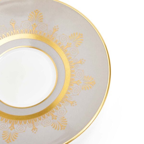 701587433006-Wedgwood-Anthemion-Grey-Teacup+Saucer-detail2-1200x1200-100KB Close-up shot of Wedgwood Anthemion Grey Tea Cup and Saucer defined by a sophisticated grey rim and an intricate neoclassical palmette border finished with 22-carat gold detailing | Kneen & Co