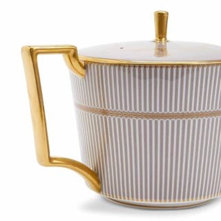 Close-up shot of Wedgwood Anthemion Grey Teapot defined by a sophisticated grey rim and an intricate neoclassical palmette border finished with 22-carat gold detailing | Kneen & Co