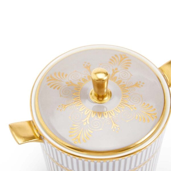 701587433037-Wedgwood-Anthemion-Grey-Sugar+Creamer-Set-detail Close-up shot of Wedgwood Anthemion Grey Sugar and Creamer Set defined by a sophisticated rim and an intricate neoclassical palmette border finished with 22-carat gold detailing | Kneen & Co