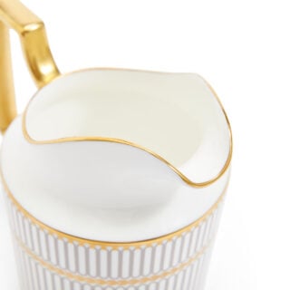 701587433037-Wedgwood-Anthemion-Grey-Sugar+Creamer-Set-detail3 Close-up shot of Wedgwood Anthemion Grey Sugar and Creamer Set defined by a sophisticated rim and an intricate neoclassical palmette border finished with 22-carat gold detailing | Kneen & Co