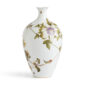 Close-up shot of Wedgwood Hummingbird Large Vase defined by expressive floral motifs and an artfully sculpted bird finial finished with 22-carat gold detailing | Kneen & Co