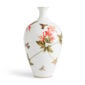 Close-up shot of Wedgwood Hummingbird Medium Vase defined by expressive floral motifs and an artfully sculpted bird finial finished with 22-carat gold detailing | Kneen & Co