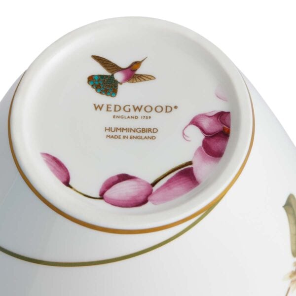 701587436861-Wedgwood-Hummingbird-Vase 25cm-backstamp-1200x1200-100KB Close-up shot of Wedgwood Hummingbird Medium Vase defined by expressive floral motifs and an artfully sculpted bird finial finished with 22-carat gold detailing | Kneen & Co