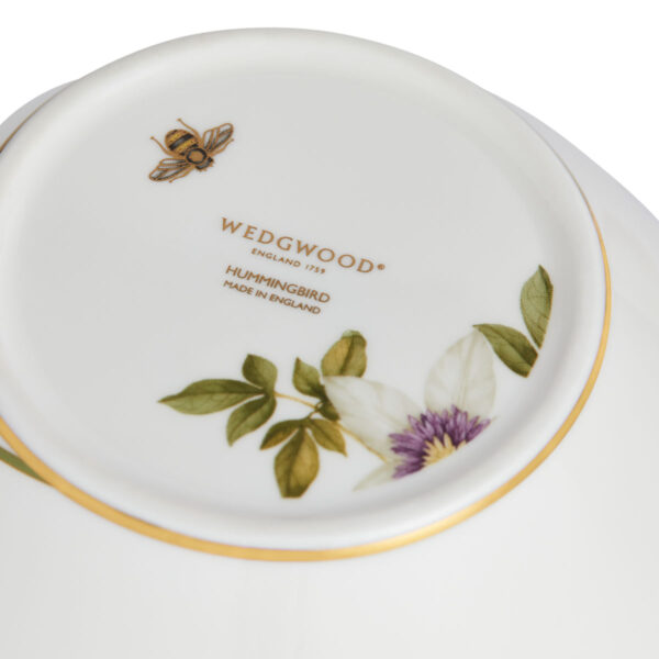 701587436878-Wedgwood-Hummingbird-Lidded Vase 25cm-backstamp-1200x1200-100KB Close-up shot of Wedgwood Hummingbird Small Lidded Vase defined by expressive floral motifs and an artfully sculpted bird finial finished with 22-carat gold detailing | Kneen & Co