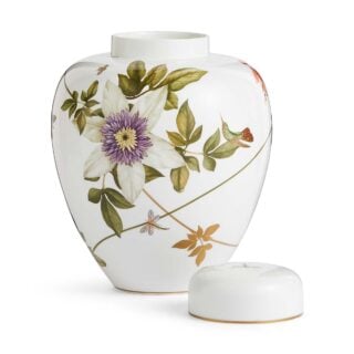 Close-up shot of Wedgwood Hummingbird Large Lidded Vase defined by expressive floral motifs and an artfully sculpted bird finial finished with 22-carat gold detailing | Kneen & Co