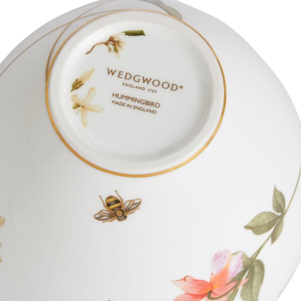701587436885-Wedgwood-Hummingbird-Lidded-Vase-15cm-backstamp-1200x1200-100KB Close-up shot of Wedgwood Hummingbird Small Lidded Vase defined by expressive floral motifs and an artfully sculpted bird finial finished with 22-carat gold detailing | Kneen & Co