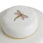 Close-up shot of Wedgwood Hummingbird Small Lidded Vase defined by expressive floral motifs and an artfully sculpted bird finial finished with 22-carat gold detailing | Kneen & Co