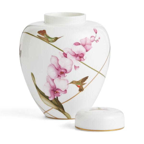 701587436885-Wedgwood-Hummingbird-Lidded-Vase-15cm-lid-1200x1200-100KB Close-up shot of Wedgwood Hummingbird Small Lidded Vase defined by expressive floral motifs and an artfully sculpted bird finial finished with 22-carat gold detailing | Kneen & Co