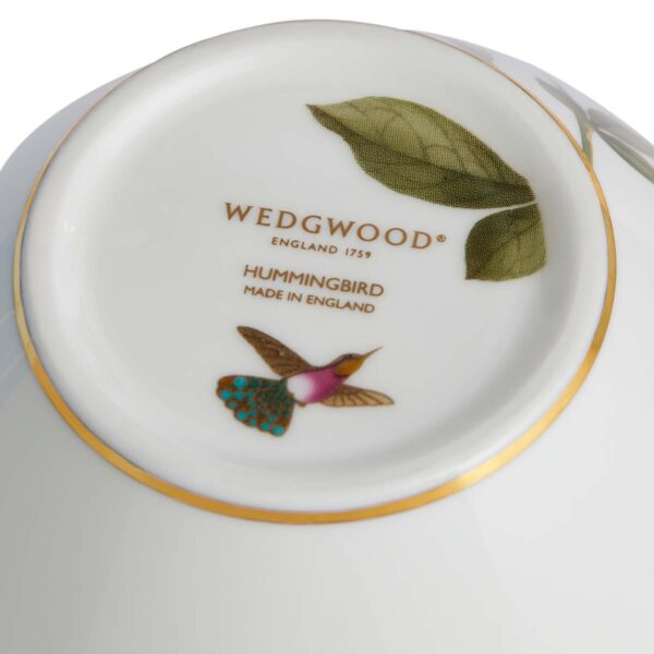701587436892-Wedgwood-Hummingbird-Vase-18cm-backstamp-1200x1200-100KB Close-up shot of Wedgwood Hummingbird Small Vase defined by expressive floral motifs and an artfully sculpted bird finial finished with 22-carat gold detailing | Kneen & Co