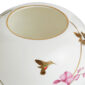 Close-up shot of Wedgwood Hummingbird Small Vase defined by expressive floral motifs and an artfully sculpted bird finial finished with 22-carat gold detailing | Kneen & Co