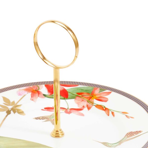 701587439756-Wedgwood-Hummingbird-2-Tier-Cake-Stand-detail2-1200x1200-100KB Close-up shot of Wedgwood Hummingbird 2-Tier Cake Stand defined by expressive floral motifs and an artfully sculpted bird finial finished with 22-carat gold detailing | Kneen & Co