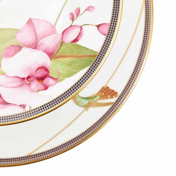 701587439756-Wedgwood-Hummingbird-2-Tier-Cake-Stand-detail3-1200x1200-100KB Close-up shot of Wedgwood Hummingbird 2-Tier Cake Stand defined by expressive floral motifs and an artfully sculpted bird finial finished with 22-carat gold detailing | Kneen & Co