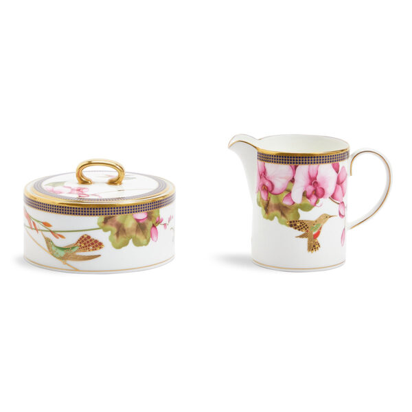 701587439763-Wedgwood-Hummingbird-Teaware-3-Piece-Set-Teapot-Sugar-Cream-detail3-1200x1200-100KB Close-up shot of Wedgwood Hummingbird 3-piece Teaware Set defined by expressive floral motifs and an artfully sculpted bird finial finished with 22-carat gold detailing | Kneen & Co